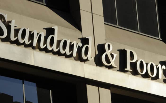 Wall Street Surges to Record Highs Amid Strong Earnings and Economic Stability - EconoTimes