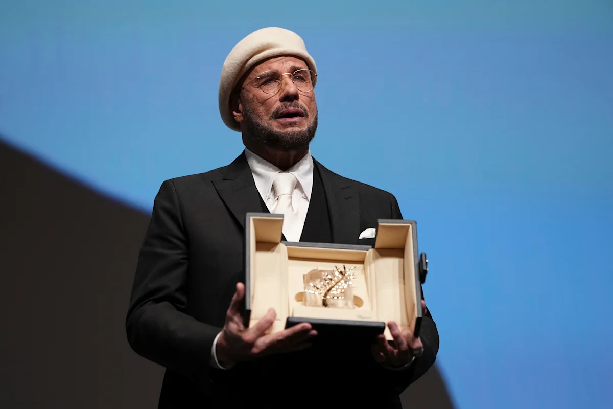 John Travolta surprised with honorary Palme d'Or at Cannes Film Festival - AOL